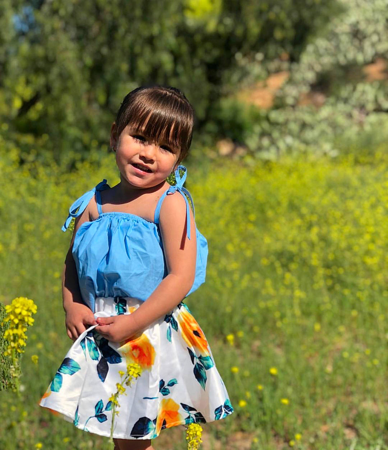 Jewel is registered to the contest to win money with this photo: botany, child, child_model, dress, flower, fun, grass, happy, meadow, pattern, people_in_nature, person, photography, plant, smile, spring, summer, textile, toddler, wildflower