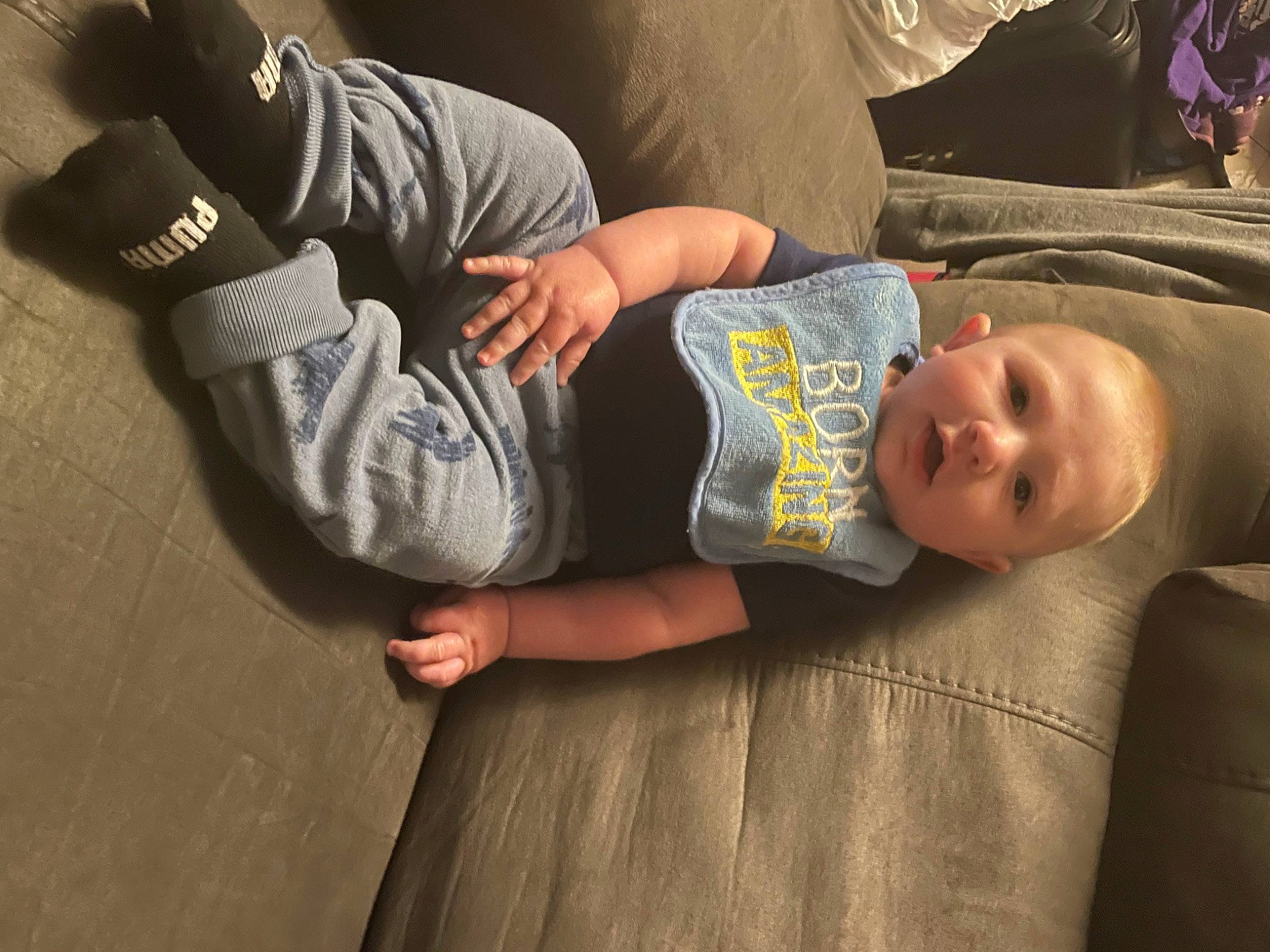 Brayden joined the competition — help win amazing prizes! abdomen, baby, comfort, elbow, finger, flash_photography, flooring, gesture, hand, human_body, human_leg, joint, knee, leg, person, sitting, sleeve, thigh, toddler, tree