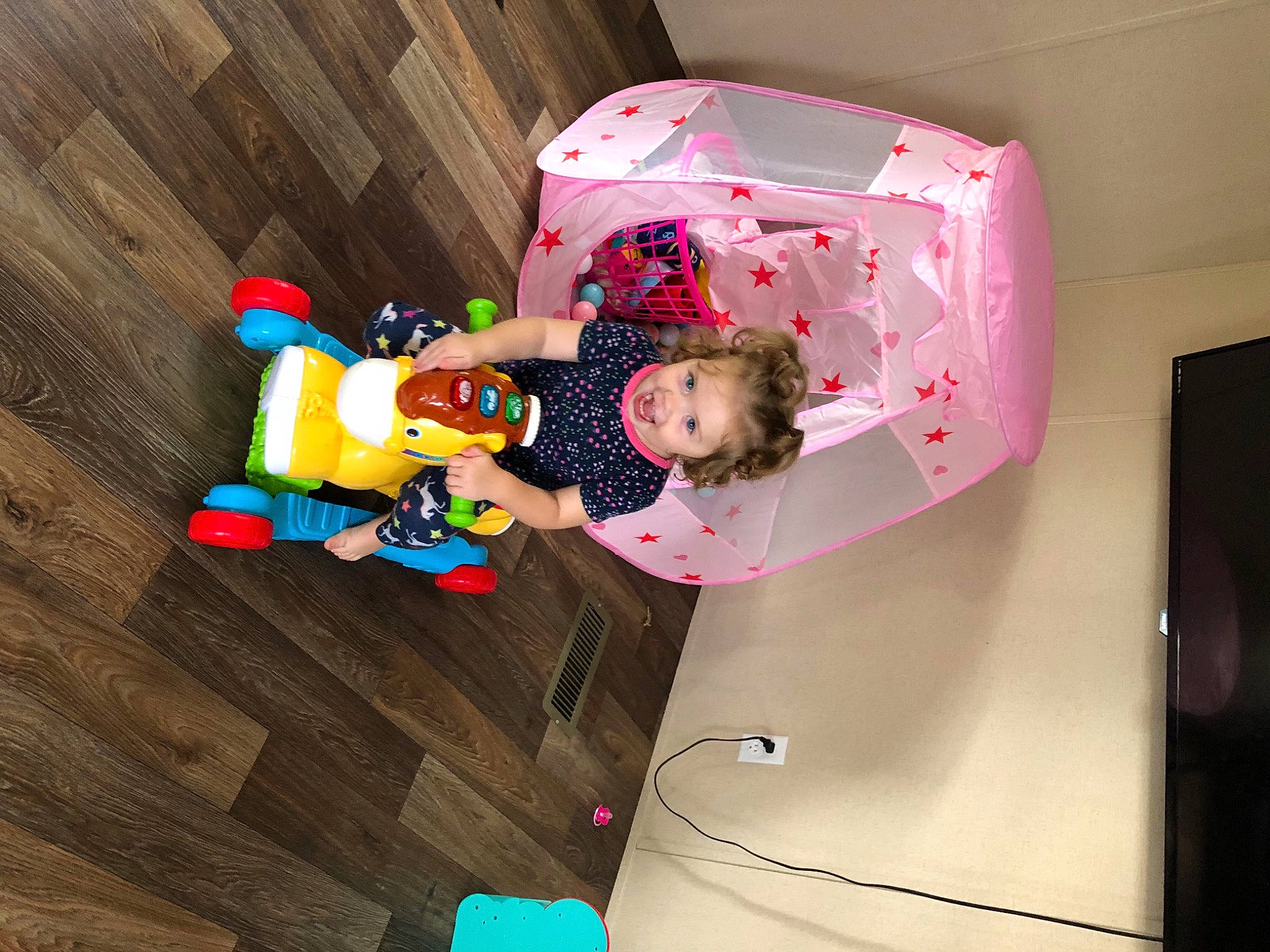 Arriyah is registered to the contest to win money with this photo: baby, baby_products, baby_toddler_clothing, baby_toys, person, pink, plastic, play, toddler, toy