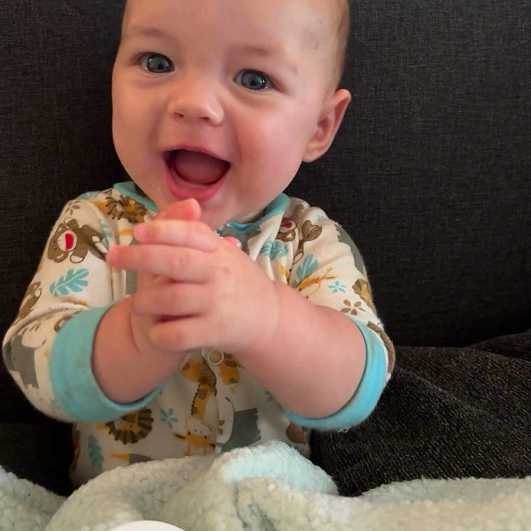 Harrison joined the competition — help win amazing prizes! baby, babylaughing, bodypart, couch, cushion, cutlery, face, furniture, happy, head, homedecor, indoors, laughing, person, photography, portrait, quilt, sitting, smile, spoon