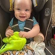 Jaxon joined the competition — help win amazing prizes! baby, smiling, car_seat, blanket, bottle, infant, child, happy, blue_shirt, safety_harness, indoor, cute, clothing, face, person, seat, baby_toy, car_seat_warning_label, holding, comfort