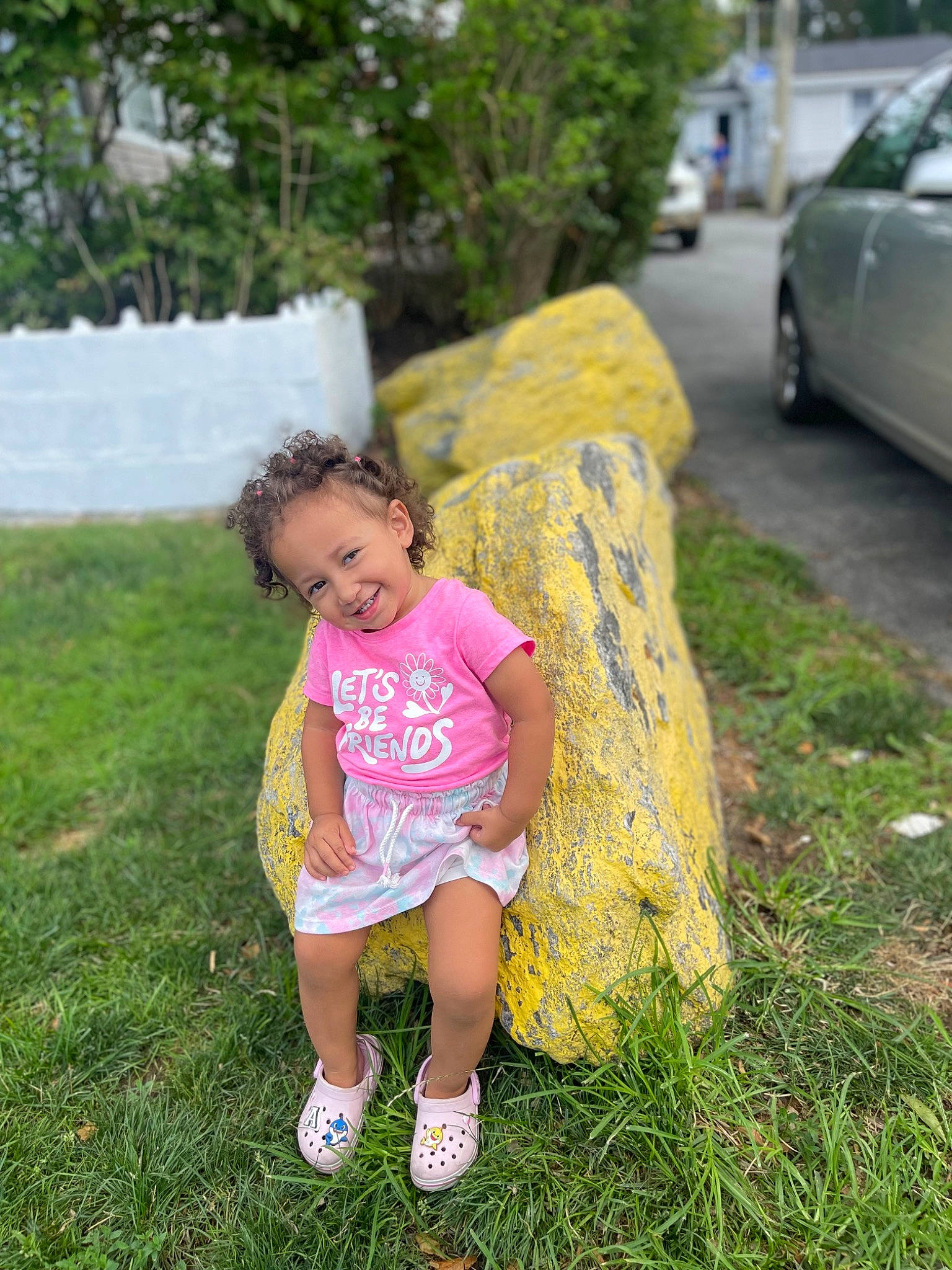 Adelynn joined the competition — help win amazing prizes! car, grass, grass_family, happy, joy, landscape, lawn, leaf, leisure, mammal, people_in_nature, person, plant, recreation, sandal, shorts, summer, t_shirt, tire, toddler