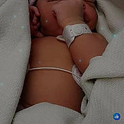 Ja'Corian is registered to the contest to win money with this photo: newborn, baby, infant, blanket, hospital, wristband, hat, sleeping, candid, closeup, soft_light, wrapped, skin, person, resting, young_child, indoors, peaceful, cute, portrait