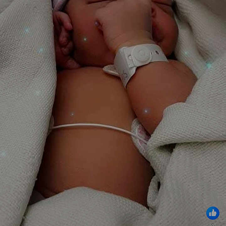 Ja'Corian is registered to the contest to win money with this photo: newborn, baby, infant, blanket, hospital, wristband, hat, sleeping, candid, closeup, soft_light, wrapped, skin, person, resting, young_child, indoors, peaceful, cute, portrait