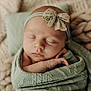 newborn, baby, sleeping, wrapped, blanket, headband, bow, soft, knit, closeup, peaceful, cozy, infant, portrait, resting, cute, toddler, child, indoors, comfort