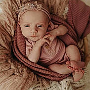 Fraeya joined the competition — help win amazing prizes! baby, infant, blanket, knitwear, headband, wrapped, sleepy, cozy, soft_texture, newborn, child, portrait, cute, warm_colors, hands, feet, resting, indoors, closeup, peaceful