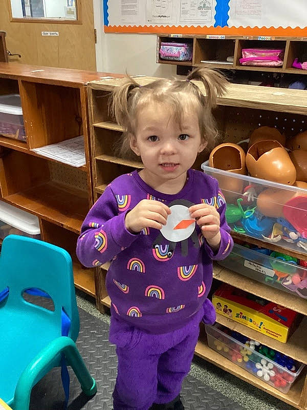 Lillyanna joined the competition — help win amazing prizes! baby_toddler_clothing, beauty, chair, child, drawer, electric_blue, fun, happy, organ, person, play, product, purple, room, shelf, shelving, smile, snapshot, standing, toddler