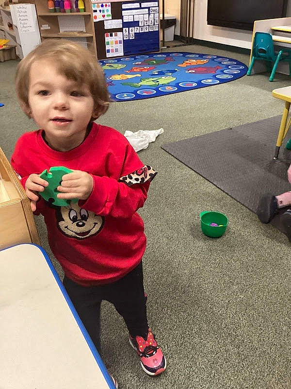 Lillyanna is registered to the contest to win money with this photo: baby_toddler_clothing, carmine, child, event, flooring, fun, games, holiday, joy, learning, leisure, person, play, recreation, room, shorts, sitting, sleeve, t_shirt, toddler