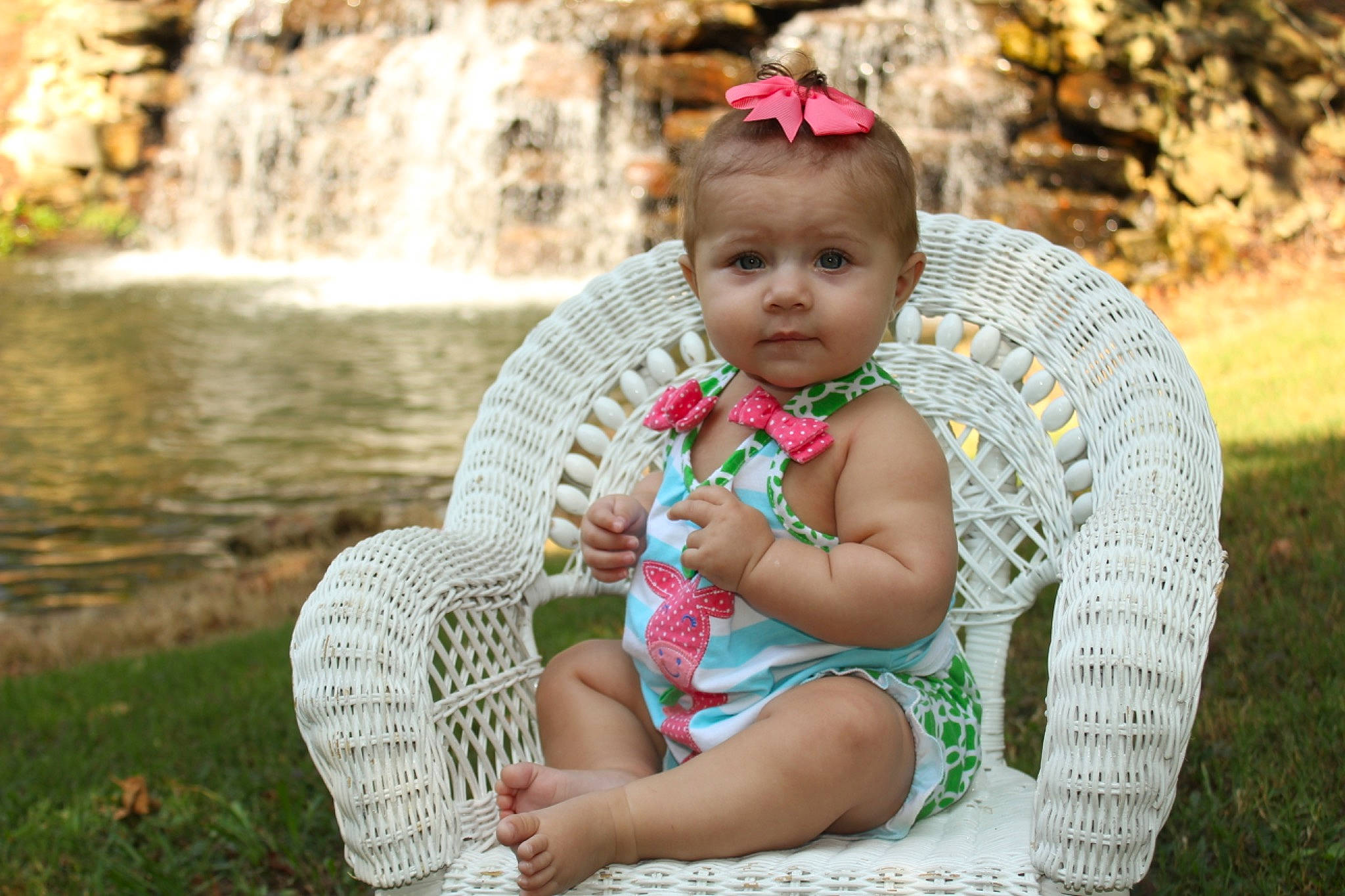 Amiyah is registered to the contest to win money with this photo: baby, botany, eye, face, facial_expression, flash_photography, fun, grass, happy, leaf, leisure, people_in_nature, person, pink, plant, skin, summer, toddler, tree, water
