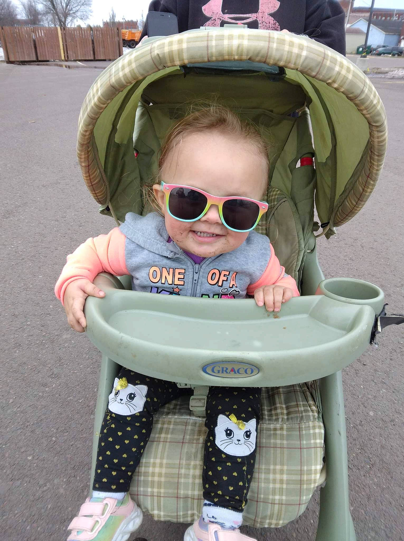Amariah is registered to the contest to win money with this photo: baby, baby_toddler_clothing, cool, eyewear, fun, goggles, green, happy, headgear, mouth, person, personal_protective_equipment, photograph, product, sleeve, smile, snapshot, sunglasses, toddler, vision_care