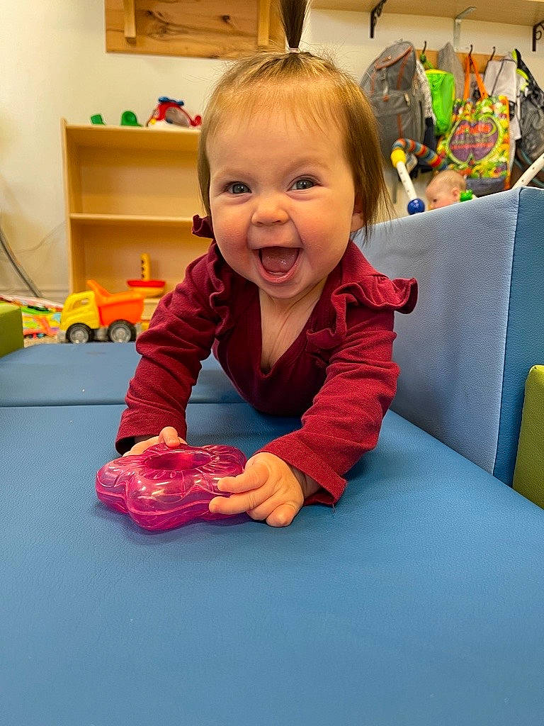 Eusebia is registered to the contest to win money with this photo: baby, baby_playing_with_toys, baby_toddler_clothing, baby_toys, carmine, cheek, child, comfort, floor, flooring, fun, happy, leisure, person, play, room, sitting, smile, toddler, toy
