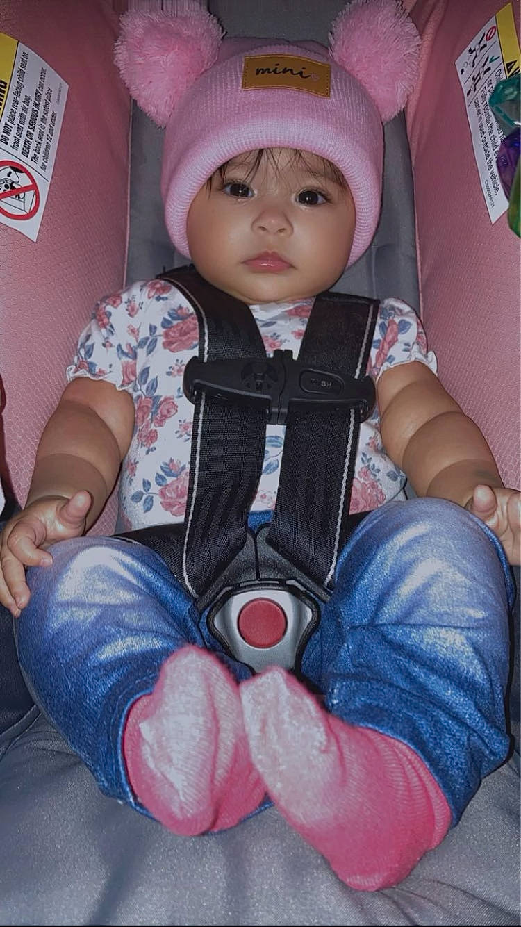 Rayella is registered to the contest to win money with this photo: accessories, baby, belt, bonnet, cap, clothing, face, glove, gun, hat, head, hosiery, jeans, pants, person, photography, portrait, sock, toy, weapon