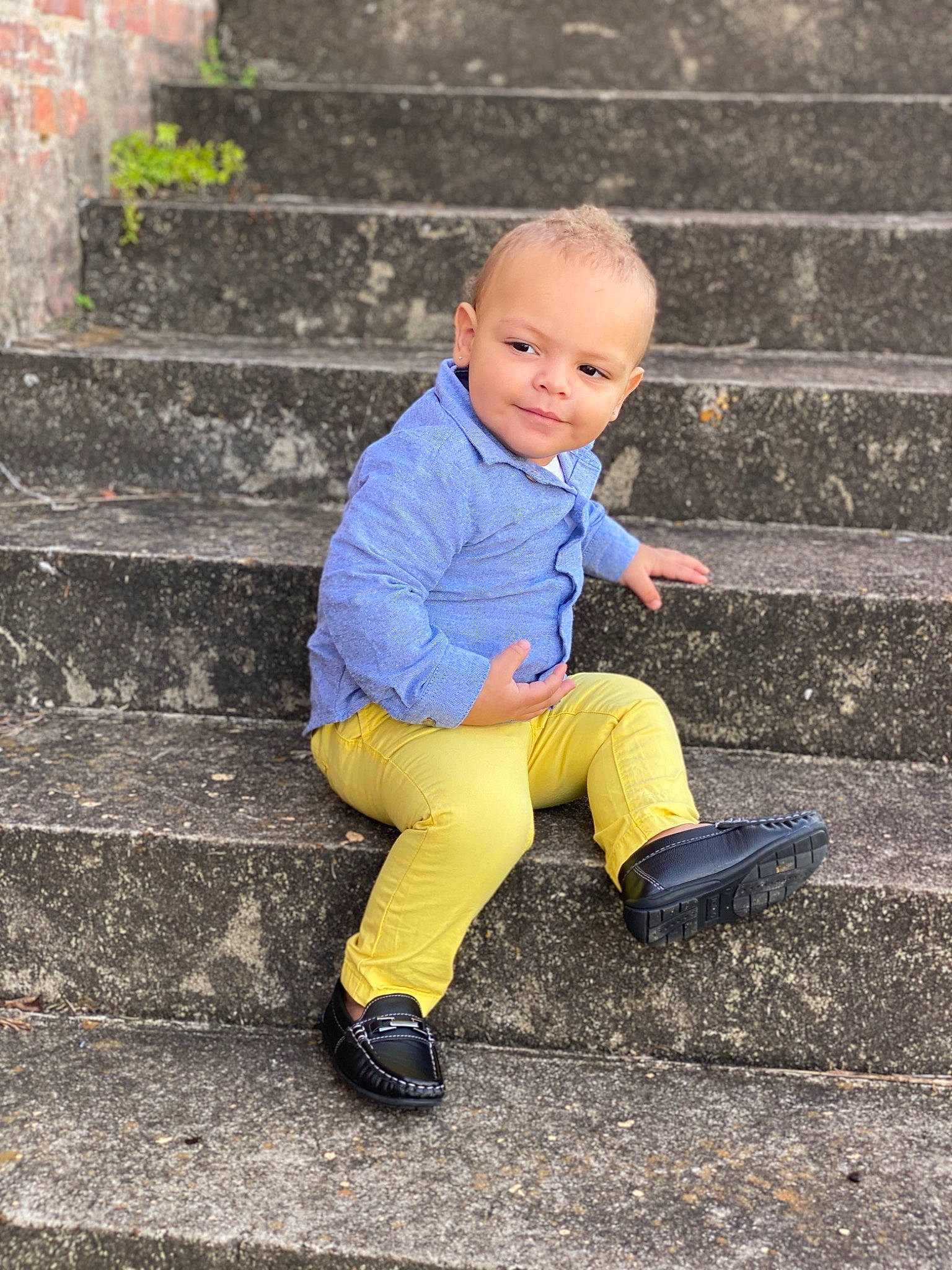 Taylan is registered to the contest to win money with this photo: baby, child, child_model, footwear, jeans, outerwear, people, person, photography, play, portrait, shoe, sitting, smile, standing, toddler, vacation, yellow