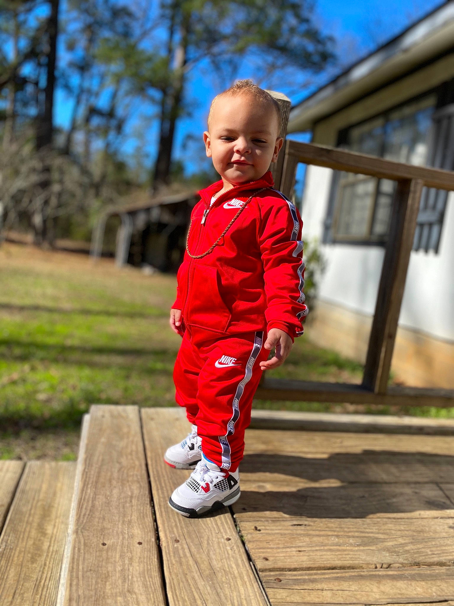 Taylan is registered to the contest to win money with this photo: child, child_model, jacket, joint, leisure, outerwear, person, photography, play, recreation, red, running, shoe, sleeve, sportswear, standing, toddler, vacation, walking, winter