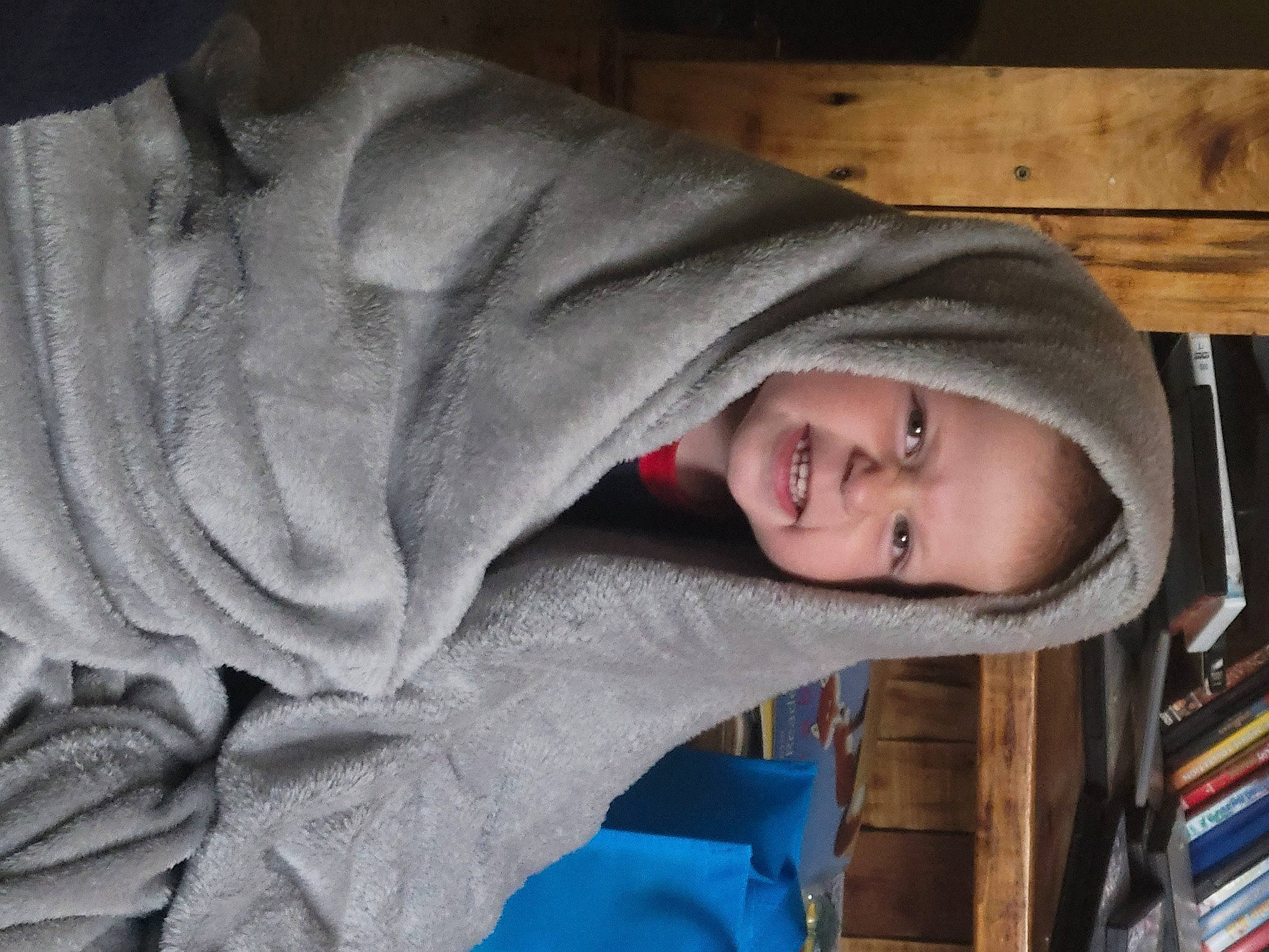 Corbyn is registered to the contest to win money with this photo: child, comfort, electric_blue, eye, freezing, fun, fur, happy, head, human_body, jacket, mouth, outerwear, person, room, sleeve, smile, tree, window, winter
