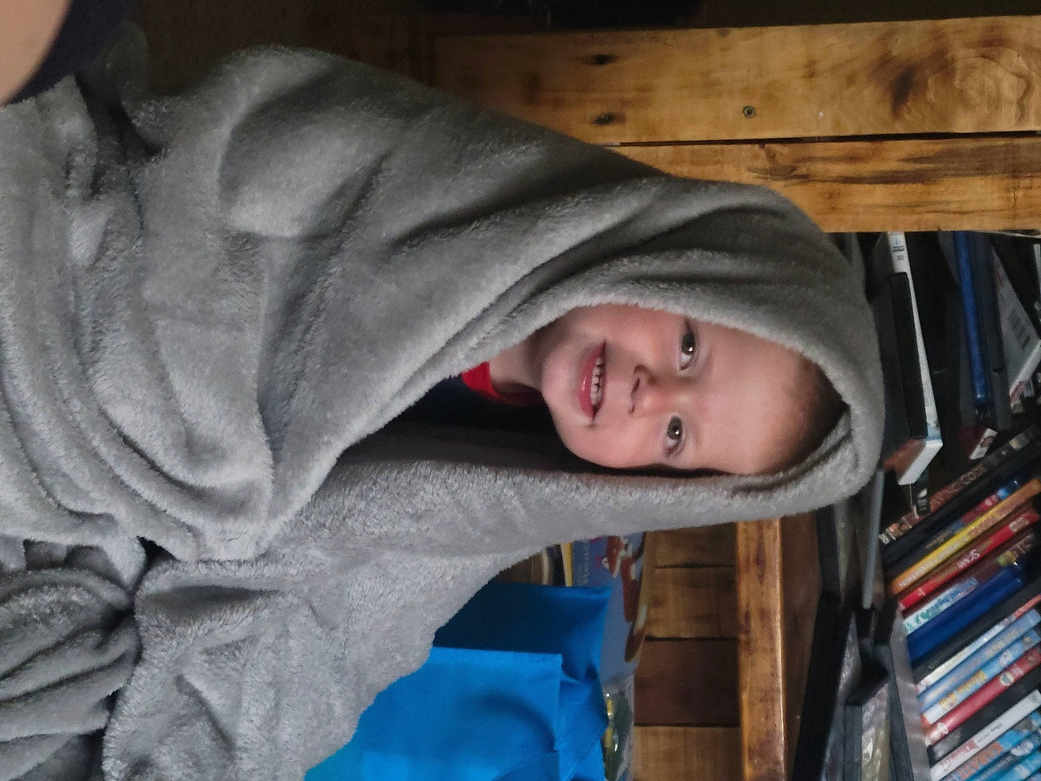 Corbyn is registered to the contest to win money with this photo: child, comfort, electric_blue, eye, fun, fur, happy, hood, hoodie, house, jacket, joy, laugh, leisure, outerwear, person, sleeve, smile, sunglasses, tree