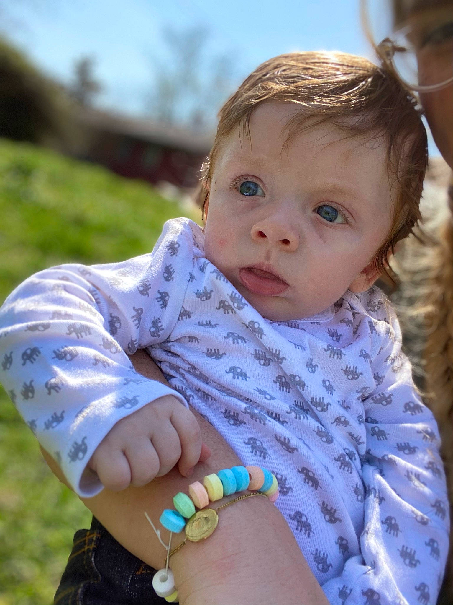 Daxx is registered to the contest to win money with this photo: arm, azure, baby, baby_toddler_clothing, child, dress, eye, face, finger, fun, grass, happy, iris, leisure, people_in_nature, person, skin, sky, summer, toddler