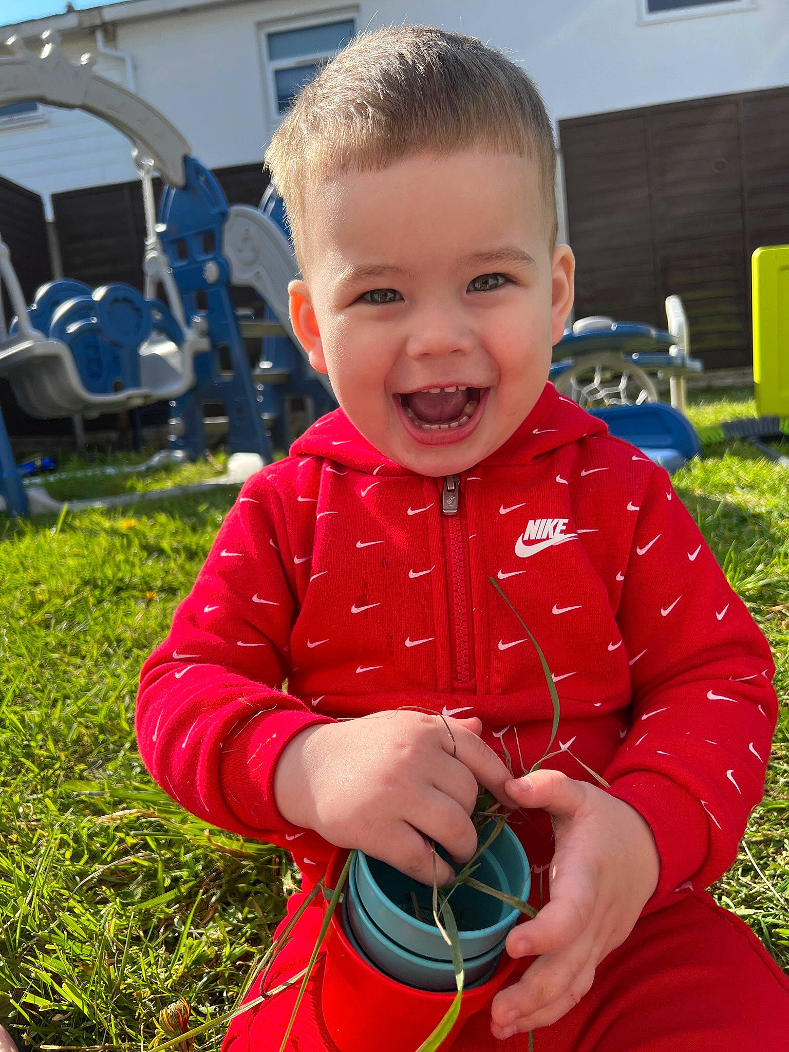 Arthur Mateo joined the competition — help win amazing prizes! baby, baby_toddler_clothing, ball, blue, eye, facial_expression, fun, grass, happy, leisure, mammal, person, public_space, recreation, skin, sky, sleeve, smile, standing, summer