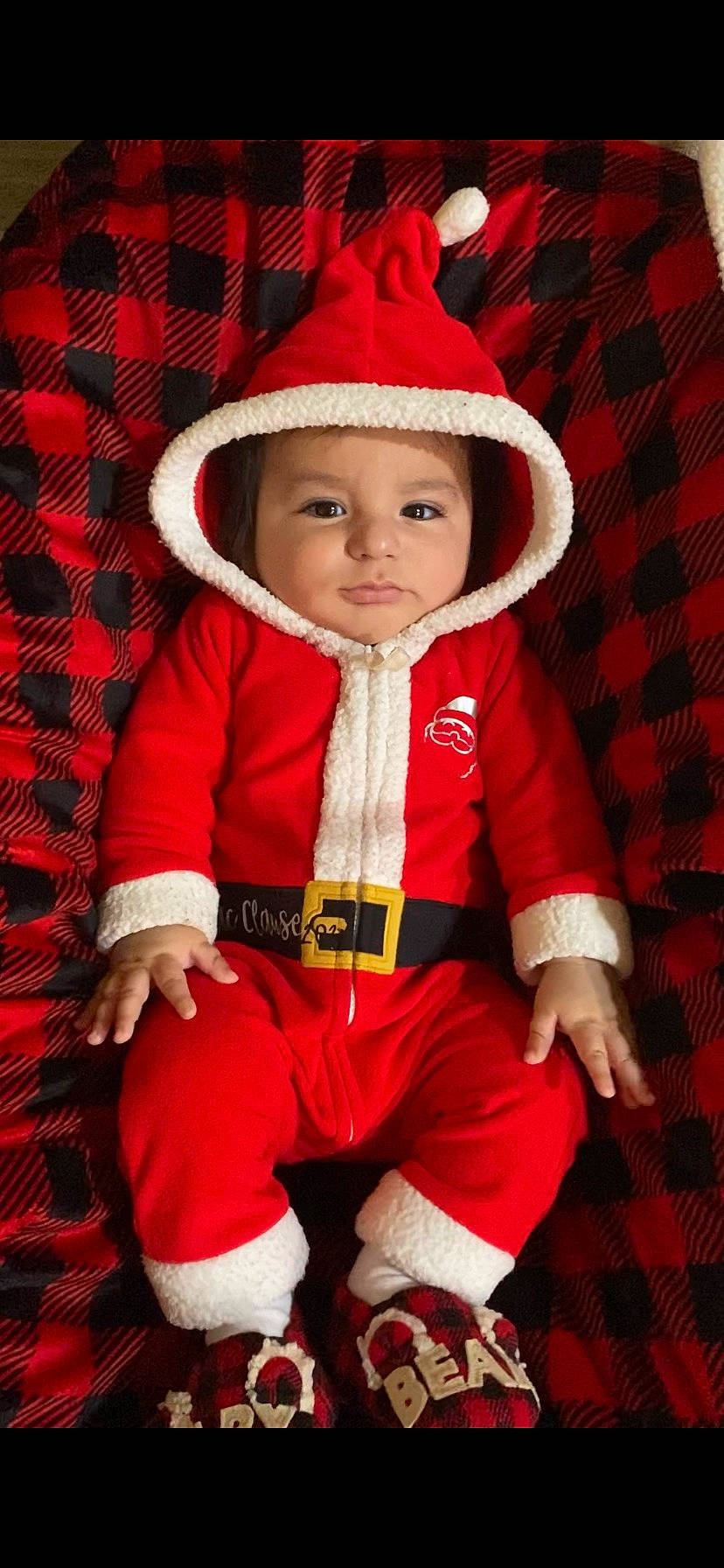 Isaac is registered to the contest to win money with this photo: baby_toddler_clothing, cap, cheek, chin, collar, costume_hat, eye, face, facial_expression, happy, hat, head, headgear, headwear, organ, outerwear, person, product, red, sleeve