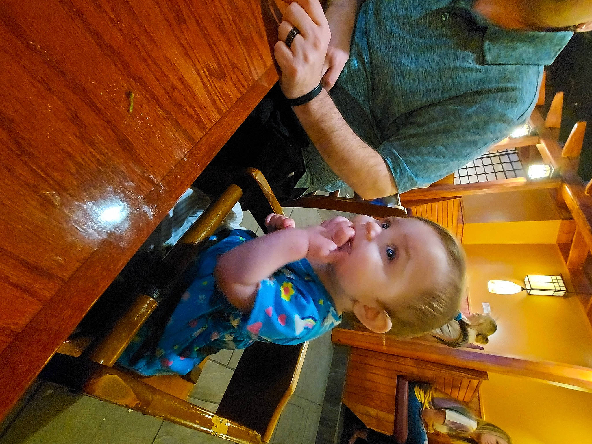 Lilyth joined the competition — help win amazing prizes! arm, baby, chair, child, elbow, finger, fun, hardwood, leisure, mouth, person, room, sitting, smile, sunglasses, t_shirt, table, toddler, varnish, wood