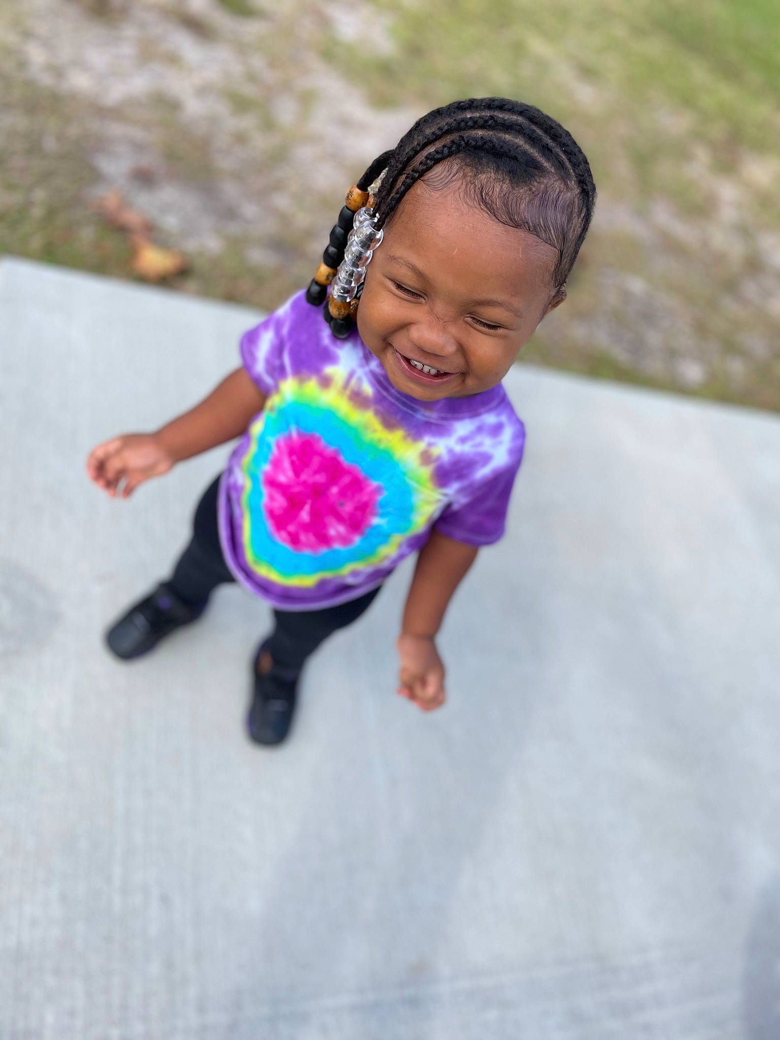 Amani joined the competition — help win amazing prizes! baby, baby_toddler_clothing, child, fashion_accessory, fun, grass, happy, jewellery, joy, leisure, magenta, pattern, person, personal_protective_equipment, play, portrait_photography, recreation, sitting, sleeve, t_shirt