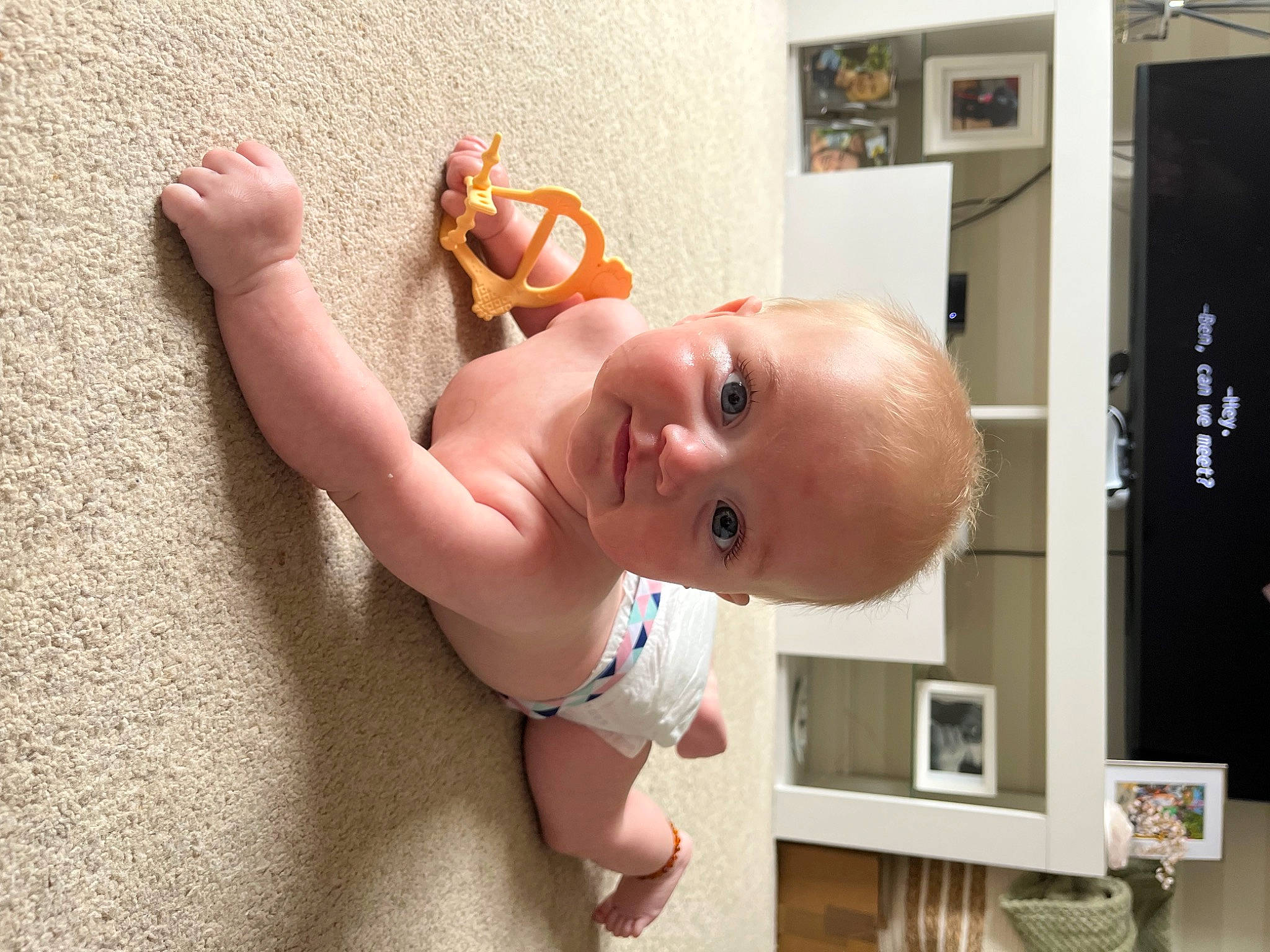 Alora joined the competition — help win amazing prizes! abdomen, baby, cheek, chest, child, dress, finger, fun, happy, human_body, mouth, nose, person, picture_frame, room, shelf, skin, smile, thumb, toddler