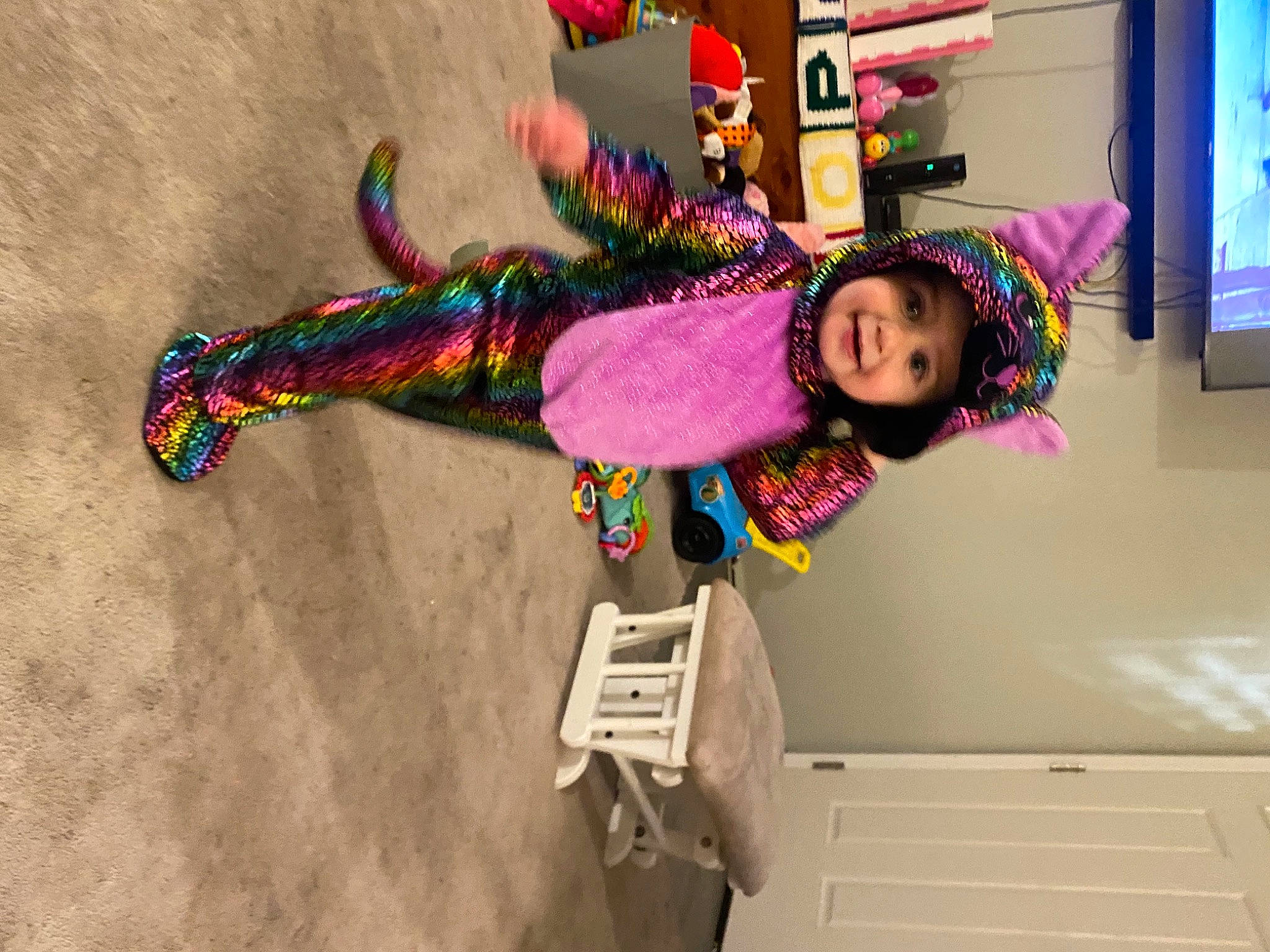 Harlow is registered to the contest to win money with this photo: art, child, costume, headwear, joy, person, pinata, pink, plant, toy