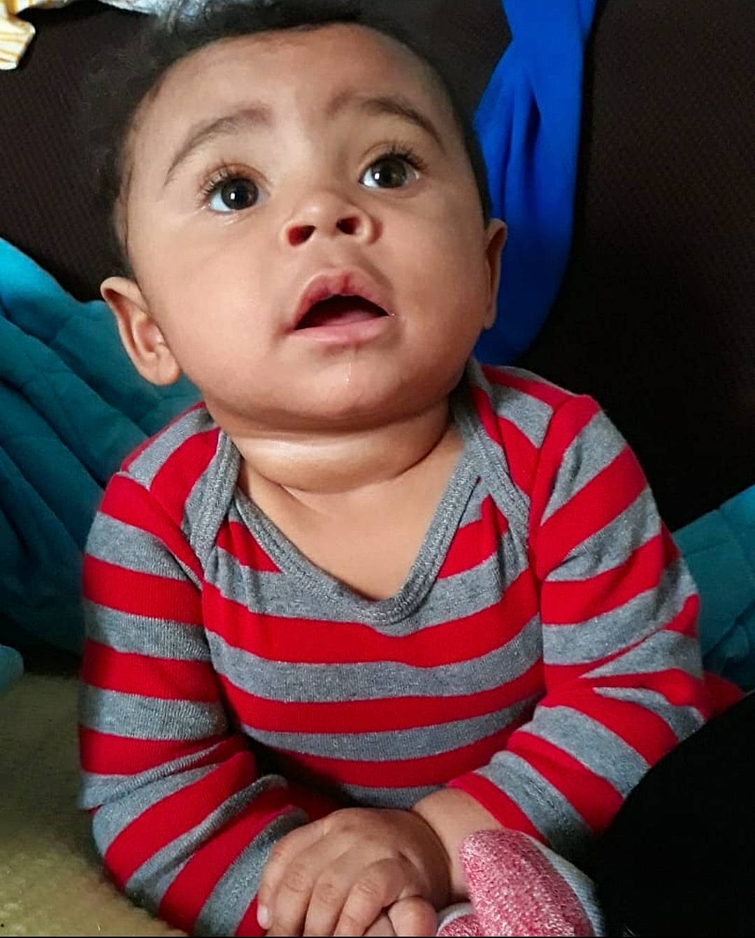 Jessiah is registered to the contest to win money with this photo: baby, cheek, child, chin, eye, face, facial_expression, fun, head, lip, mouth, nose, person, sitting, skin, smile, surprise, toddler