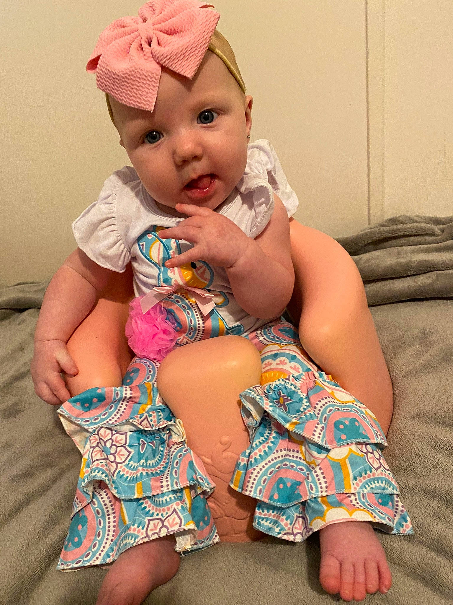 Novalee is registered to the contest to win money with this photo: arm, baby, baby_toddler_clothing, cap, dress, eye, face, finger, happy, hat, human, human_body, lip, mouth, neck, organ, person, pink, skin, textile