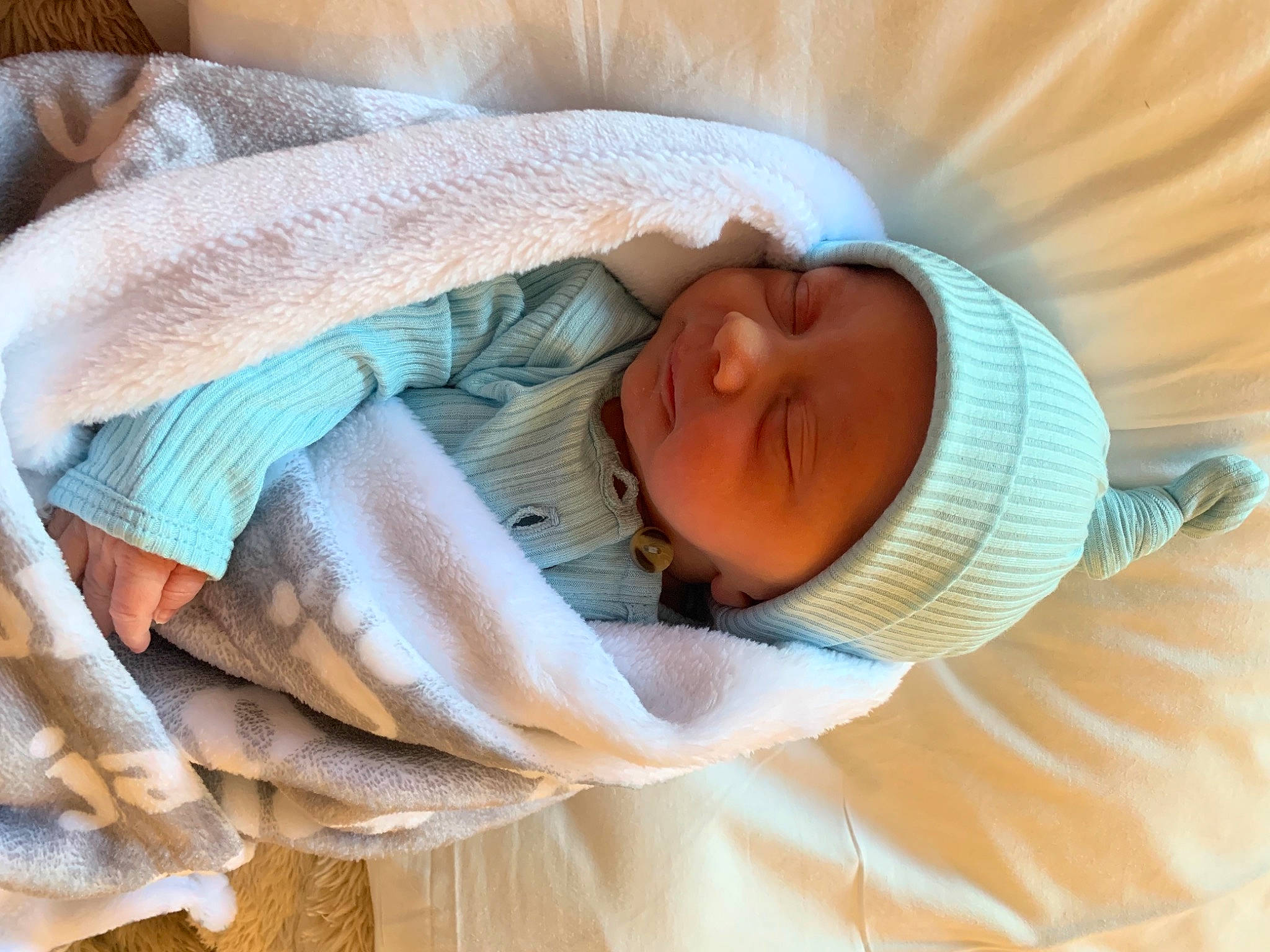 Jax is registered to the contest to win money with this photo: baby, baby_products, baby_safety, baby_sleeping, baby_toddler_clothing, bedtime, child, childbirth, comfort, hat, headwear, linens, nap, person, product, room, skin, sleep, textile, thumb