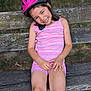 Lorena a rejoint le concours — aidez-le/la à gagner de superbes lots ! bench, casual, child, clothing, daylight, girl, greenery, happy, helmet, nature, outdoor, pink, playful, portrait, shorts, sitting, smiling, summer, tank_top, wood