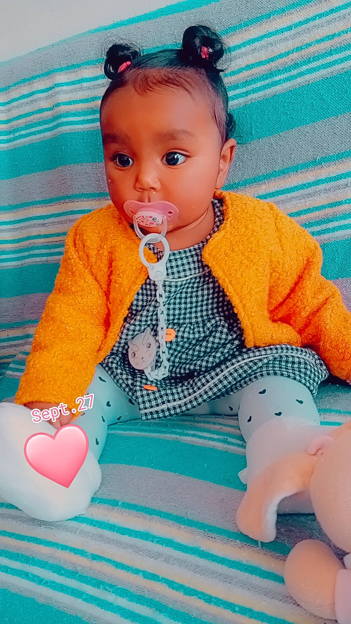 Cataleya a rejoint le concours — aidez-le/la à gagner de superbes lots ! aqua, baby, baby_toddler_clothing, beauty, blue, child, comfort, facial_expression, green, happy, human, orange, organ, outerwear, person, pink, product, skin, sleeve, surprise