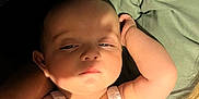 Jazlynn joined the competition — help win amazing prizes! baby, infant, sleepy, blanket, arm, face, skin, clothing, soft, light, shadow, person, resting, young_child, cute, indoors, portrait, comfort, peaceful, hand