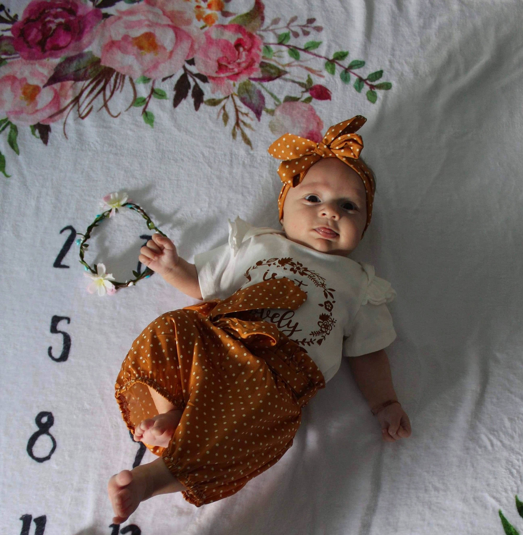 Léonie a rejoint le concours — aidez-le/la à gagner de superbes lots ! child, doll, dress, eye, fashion_accessory, fashion_design, fawn, flower, fur, hand, headgear, headpiece, headwear, linens, pattern, peach, person, petal, pink, sleeve