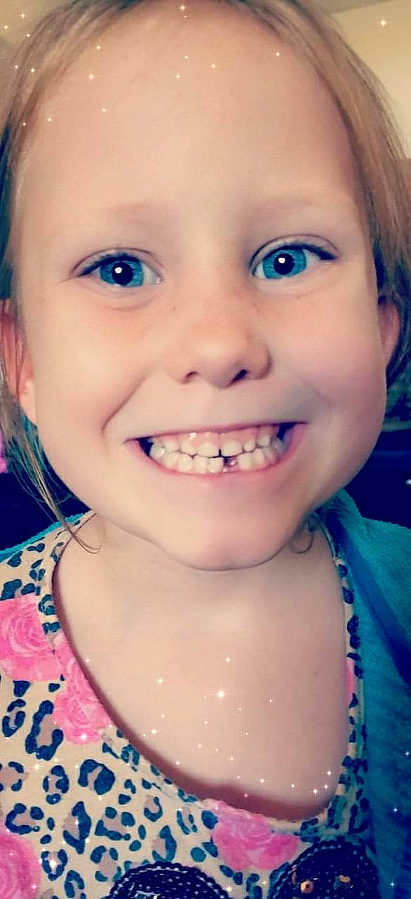 Emily is registered to the contest to win money with this photo: cheek, child, chin, close_up, eye, eyebrow, face, facial_expression, forehead, fun, hair, head, jaw, joy, lip, mouth, nose, organ, person, skin