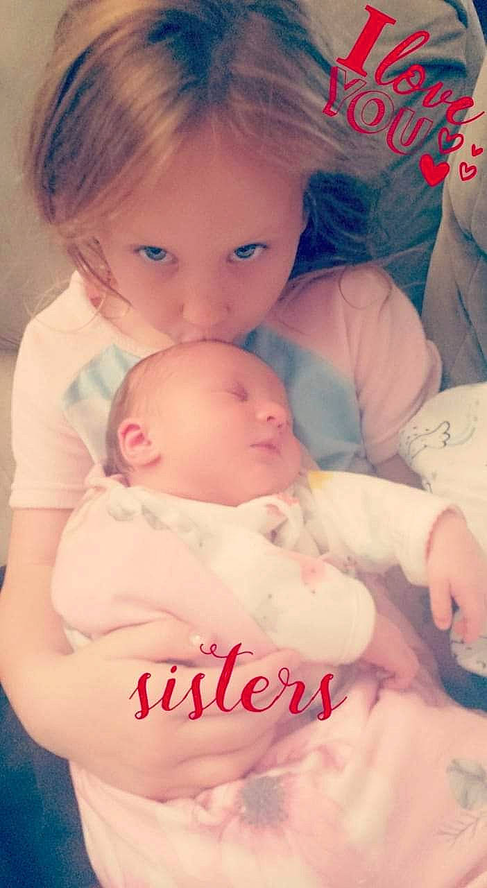 Emily is registered to the contest to win money with this photo: baby, cheek, child, happy, iris, love, person, photo_caption, pink, product, sibling, skin, smile, thumb, toddler