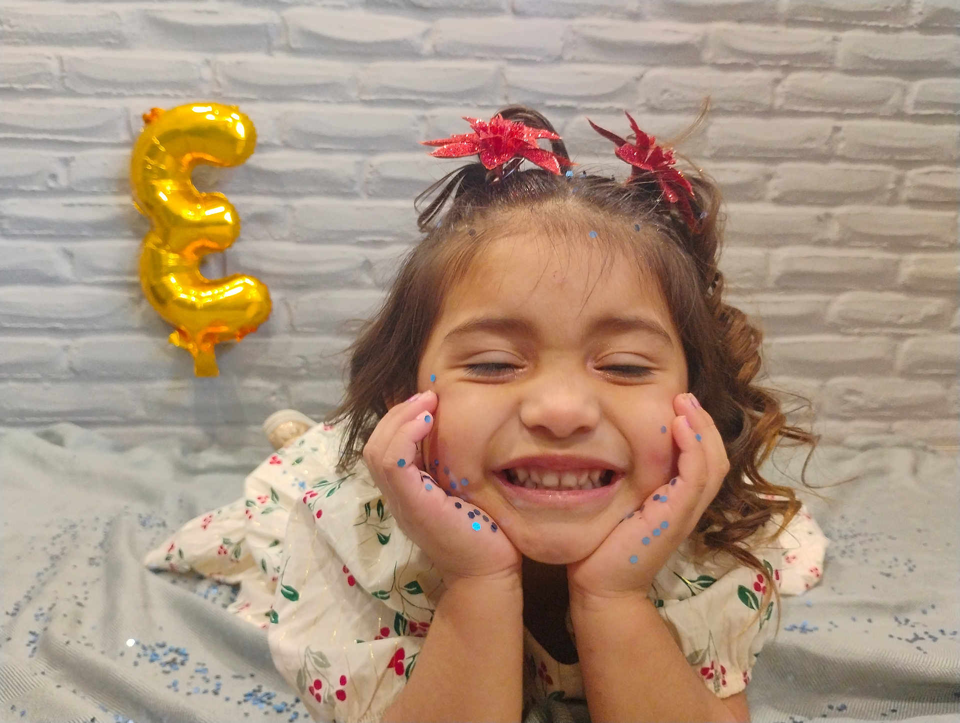 Brooklyn is registered to the contest to win money with this photo: accessories, balloon, bodypart, child, cream, face, female, finger, girl, hand, happy, head, jewelry, number, person, photography, portrait, smile, symbol, text