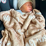 Colsen joined the competition — help win amazing prizes! newborn, baby, sleeping, blanket, hat, car_seat, infant, child, cozy, wrapped, soft, peaceful, face, headwear, transport, seatbelt, indoors, closeup, portrait, resting