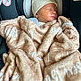 newborn, baby, sleeping, blanket, hat, car_seat, infant, child, cozy, wrapped, soft, peaceful, face, headwear, transport, seatbelt, indoors, closeup, portrait, resting