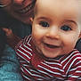 baby, adult, glasses, smile, face, striped_clothing, selfie, closeup, happy, child, person, camera_interface, portrait, indoor, human, eyewear, head, cheerful, cute, apparel