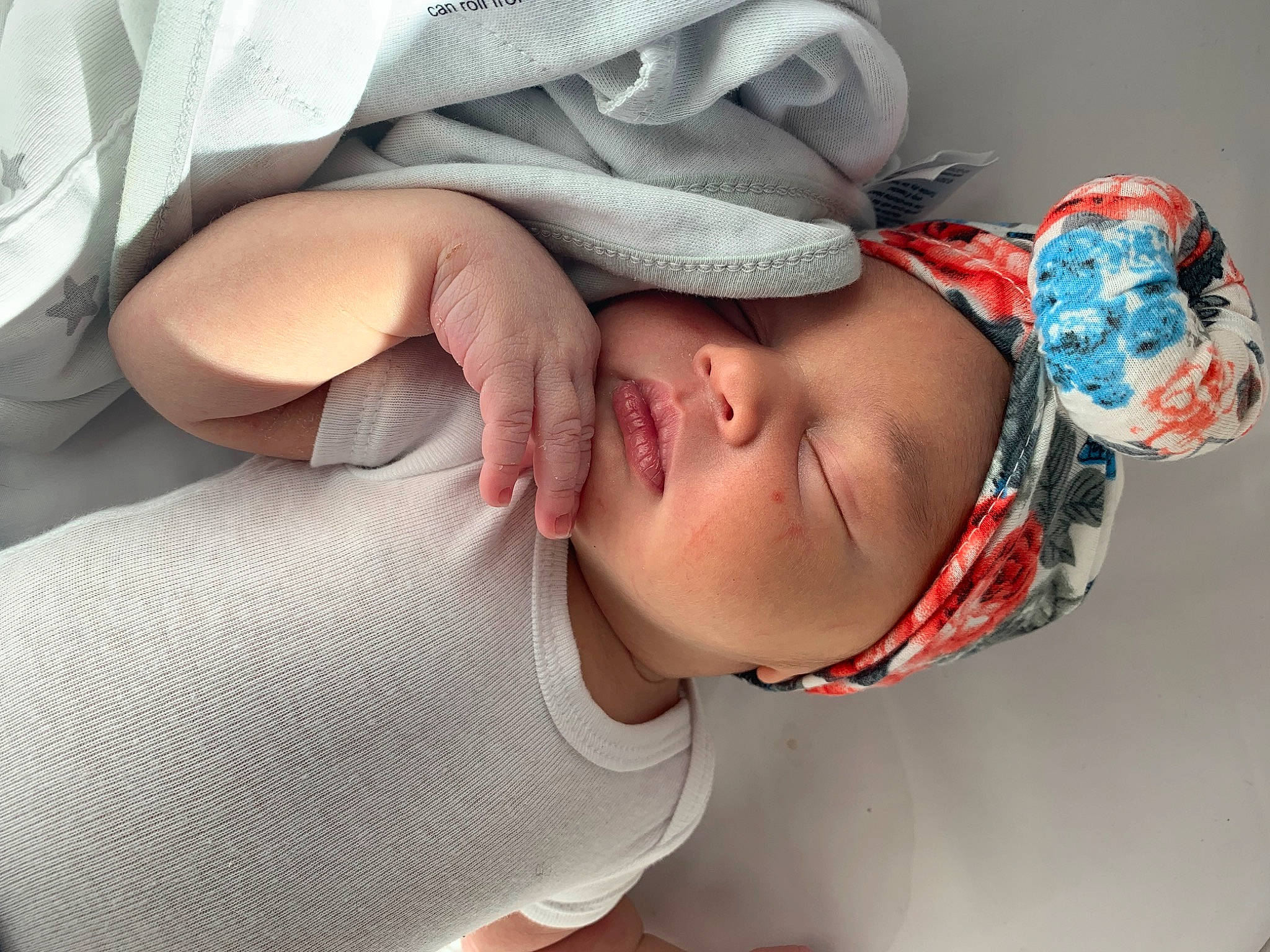 Kaliyah Kay-nicole is registered to the contest to win money with this photo: baby, chest, child, comfort, elbow, eye, eyelash, eyewear, fashion_accessory, finger, gesture, headwear, joint, lip, mouth, nail, neck, person, personal_protective_equipment, sleeve