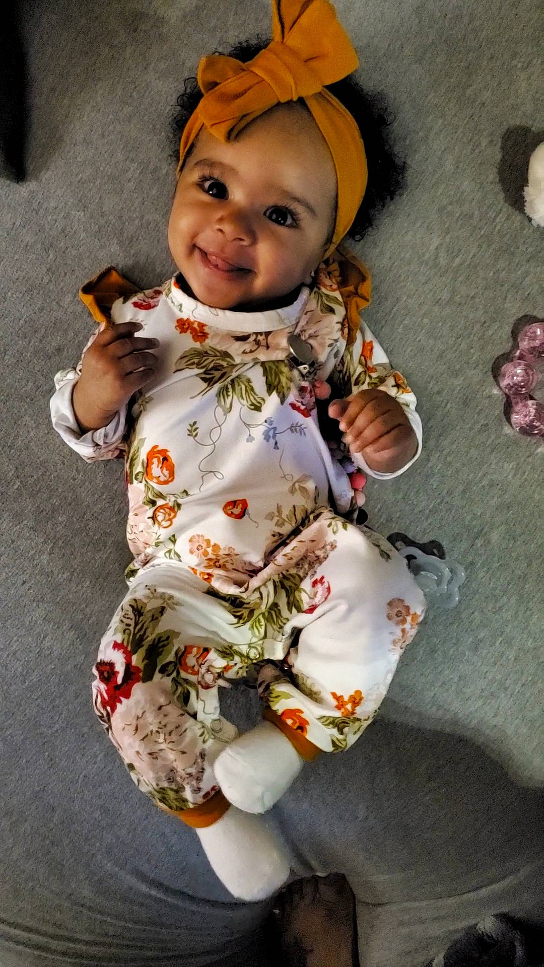 Jiannah is registered to the contest to win money with this photo: baby, baby_toddler_clothing, cap, cheek, child, doll, dress, eye, face, happy, head, joy, kimono, orange, person, sitting, skin, sleeve, smile, stuffed_toy