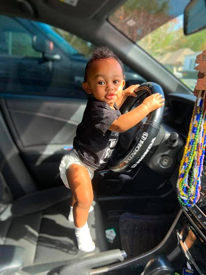 Kaisyn is registered to the contest to win money with this photo: auto_part, automotive_design, automotive_exterior, automotive_window_part, car, car_seat, child, city_car, driving, family_car, glass, luxury_vehicle, motor_vehicle, person, product, steering_wheel, toddler, vehicle, vehicle_door, windshield