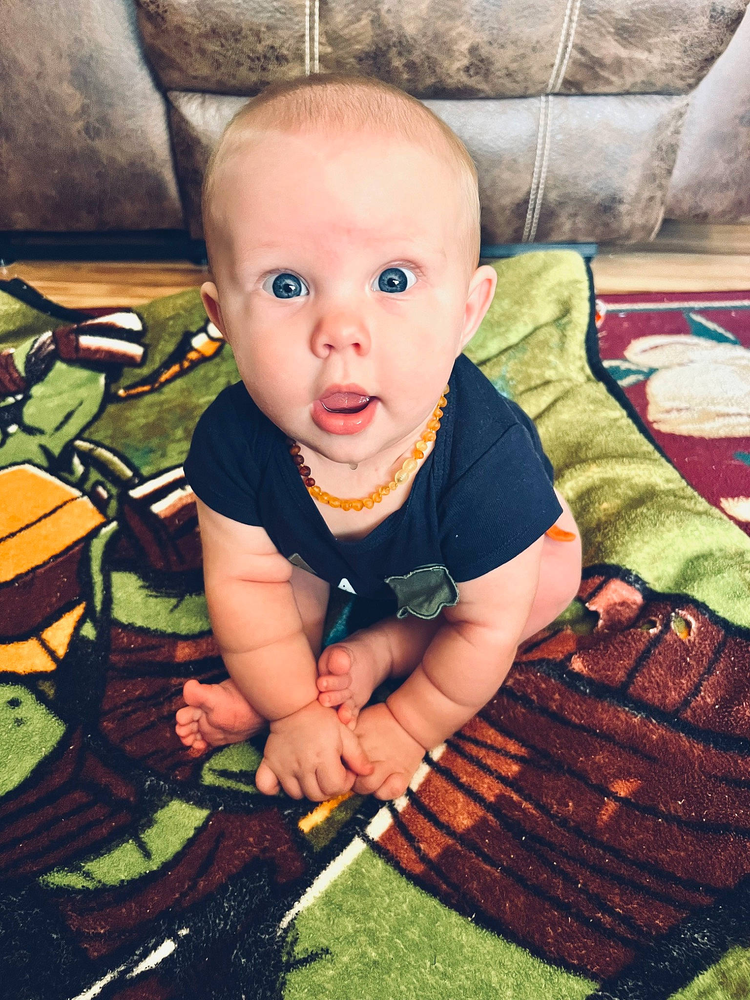 Kash joined the competition — help win amazing prizes! baby, baby_products, baby_toddler_clothing, beauty, chair, cheek, child, comfort, eye, flooring, fun, grass, hairstyle, happy, pattern, people_in_nature, person, play, sitting, surprise
