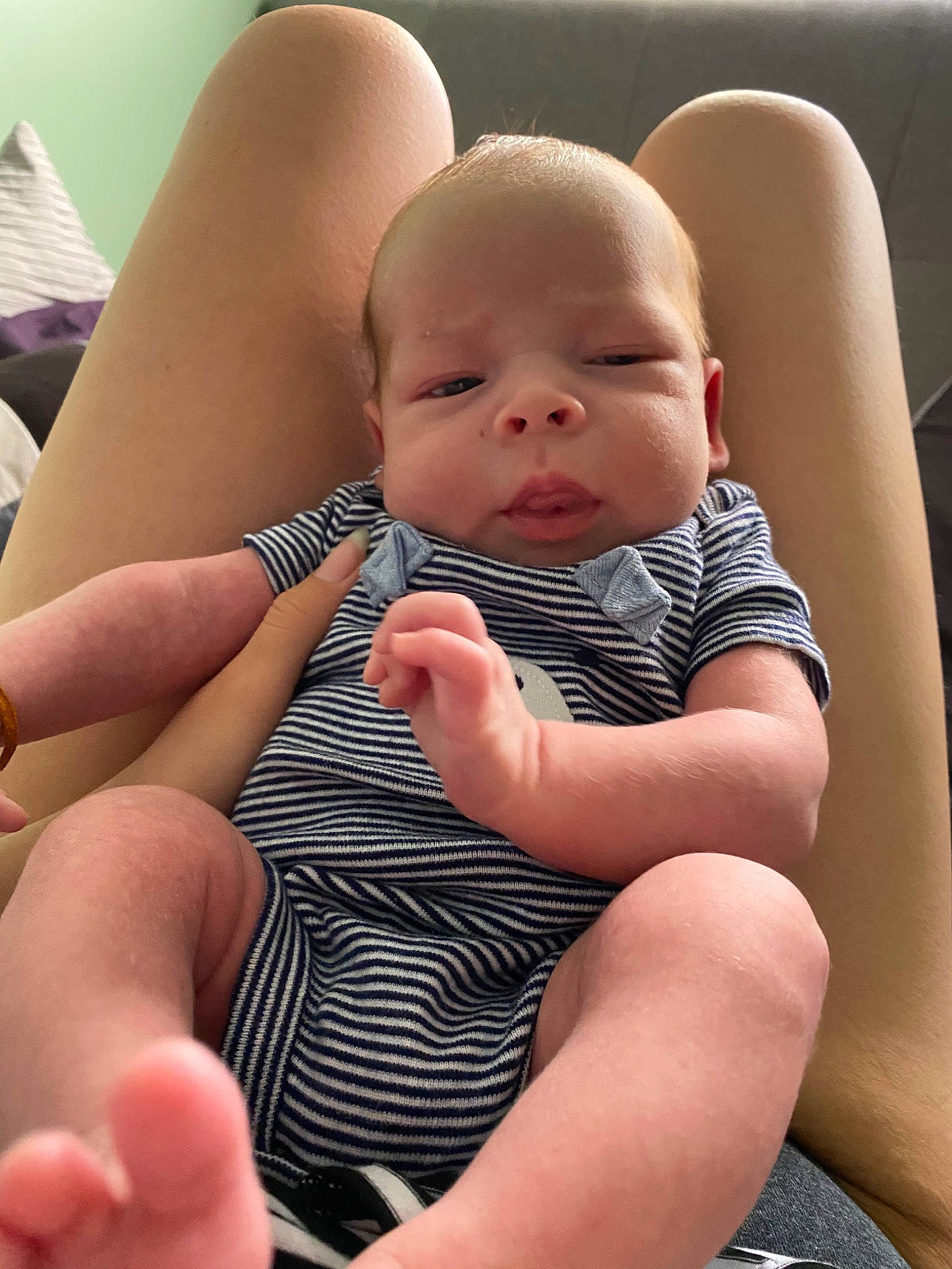 Atreyu joined the competition — help win amazing prizes! arm, baby, cheek, child, face, finger, foot, hand, head, human_leg, leg, mouth, nail, person, sitting, skin, sole, thigh, thumb, toddler