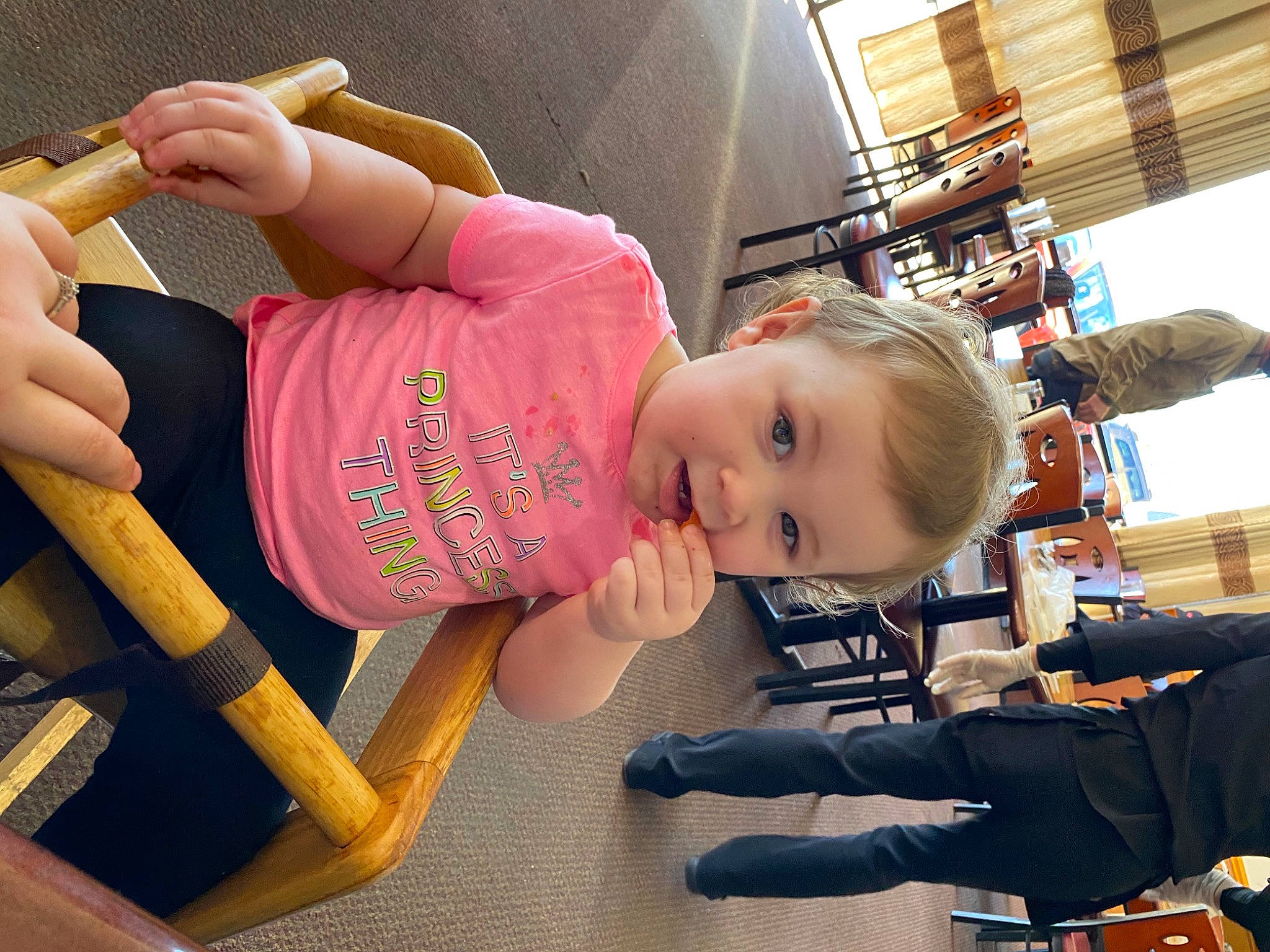 Payton is registered to the contest to win money with this photo: arm, baby, baby_toddler_clothing, child, flooring, fun, happy, human_leg, knee, leisure, person, play, product, sitting, snapshot, sneakers, sock, t_shirt, thigh, toddler