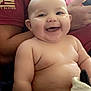 Kolsen is registered to the contest to win money with this photo: baby, smiling, happy, chubby, child, person, indoor, couch, adult, shirt, arm, skin, face, head, blanket, comfort, seated, closeup, portrait, relaxed