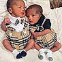 newborn, twins, baby, infant, plaid_outfit, bow_tie, white_blanket, socks, cute, lying_down, sleepy, soft_texture, matching_clothes, close_up, indoor, family, portrait, baby_boy, newborn_twins, adorable