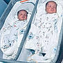 Kayden And Kaysen is registered to the contest to win money with this photo: baby, sleeping, infant, bassinet, blanket, pajamas, mickey_mouse, cozy, cute, resting, newborn, child, soft, comfort, peaceful, indoors, twin, fabric, bed, person
