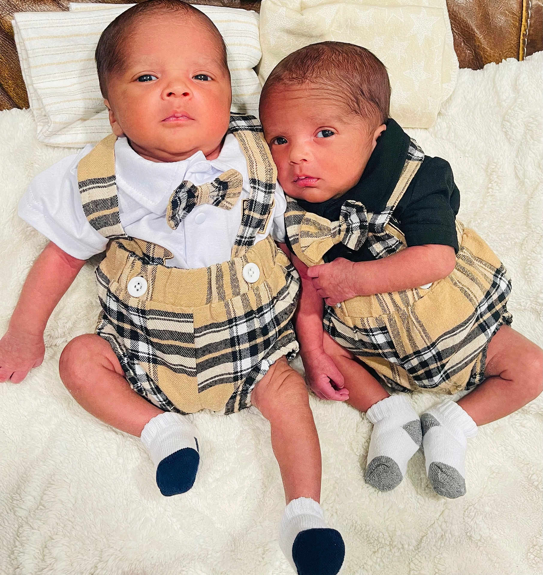 Kayden And Kaysen is registered to the contest to win money with this photo: newborn, twins, baby, plaid_outfit, bow_tie, socks, blanket, pillow, infant, cute, lying_down, indoors, portrait, human, skin, face, head, baby_clothing, soft_texture, closeup